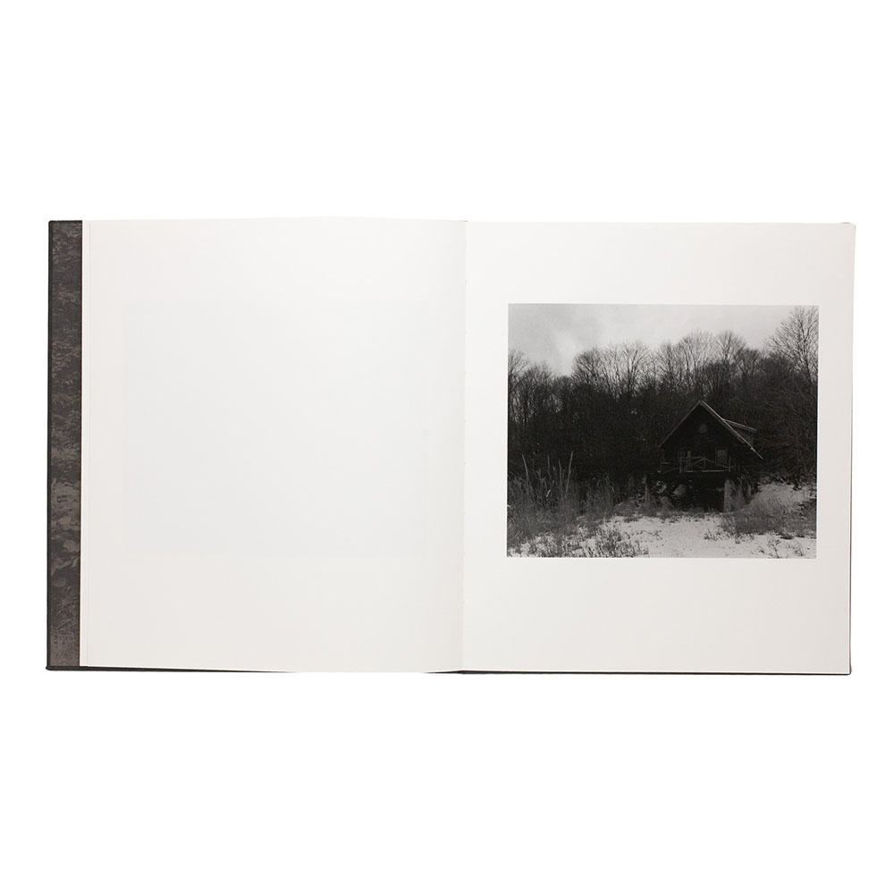 『より深い静けさのために風は唱う』　村越としや 写真集