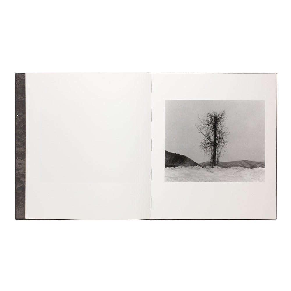 『より深い静けさのために風は唱う』　村越としや 写真集